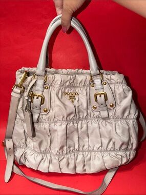 Prada Women’s Cream Leather Satchel - Elegant Gathered Design